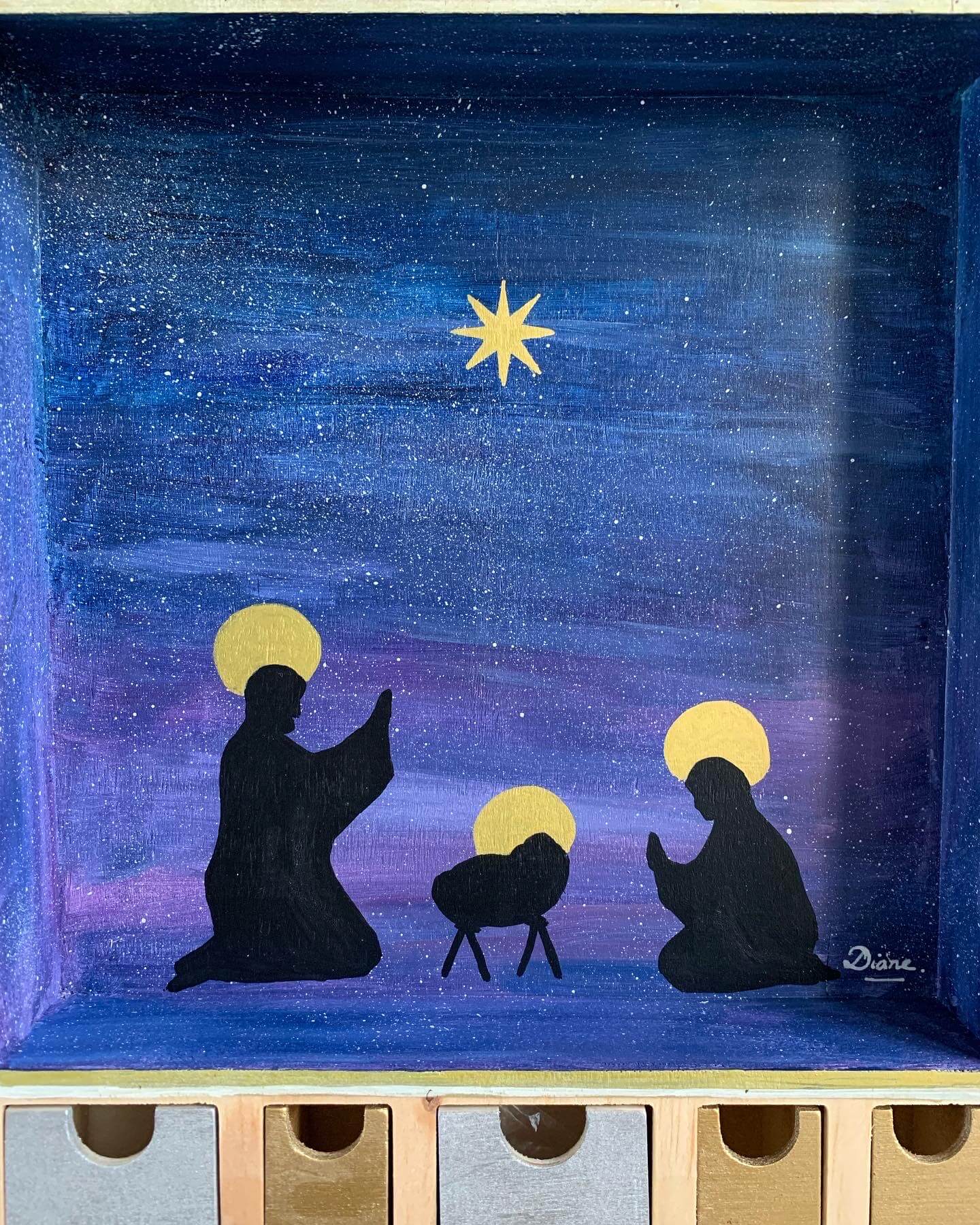 Zoom sur le décor peint du calendrier de l'Avent Nativité-nuit étoilée